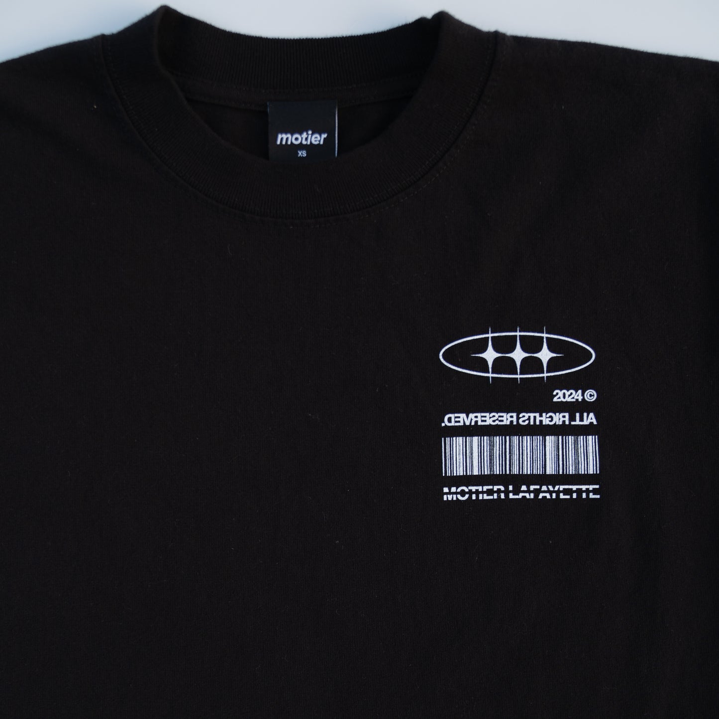 The Distortion VII Luxe Tee (Black)