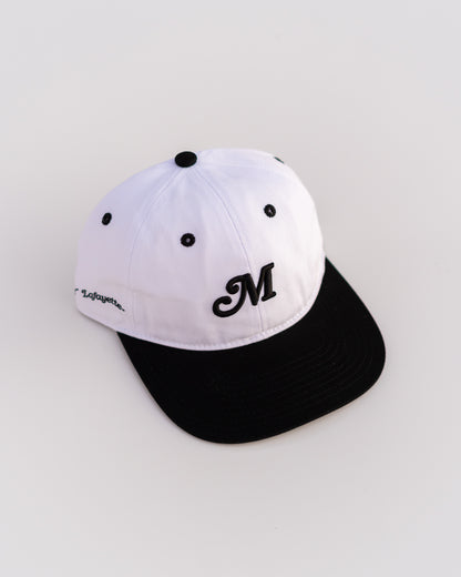 The Two Tone M Script Strapback (White/Black)